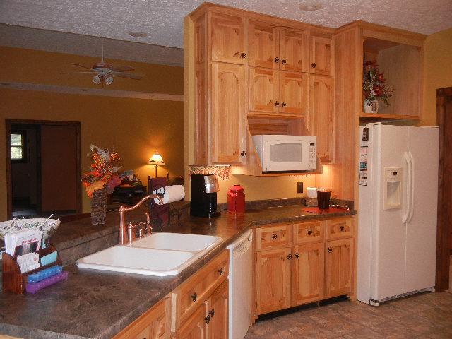 12466 Highway 108 Altamont, TN 37301 - Photo 14 of 20 One view of the Kitchen shows it open to the Living Room so eveeryone can be together.