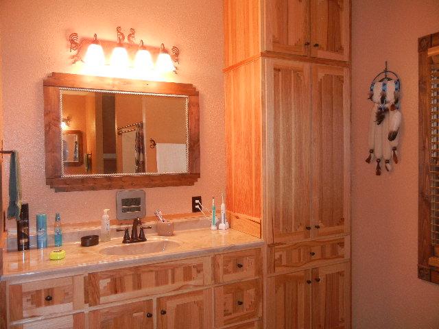 12466 Highway 108 Altamont, TN 37301 - Photo 8 of 20 There are 2 vanities and abundant storage in the Master Bath. Notice the custom designed mirrors.