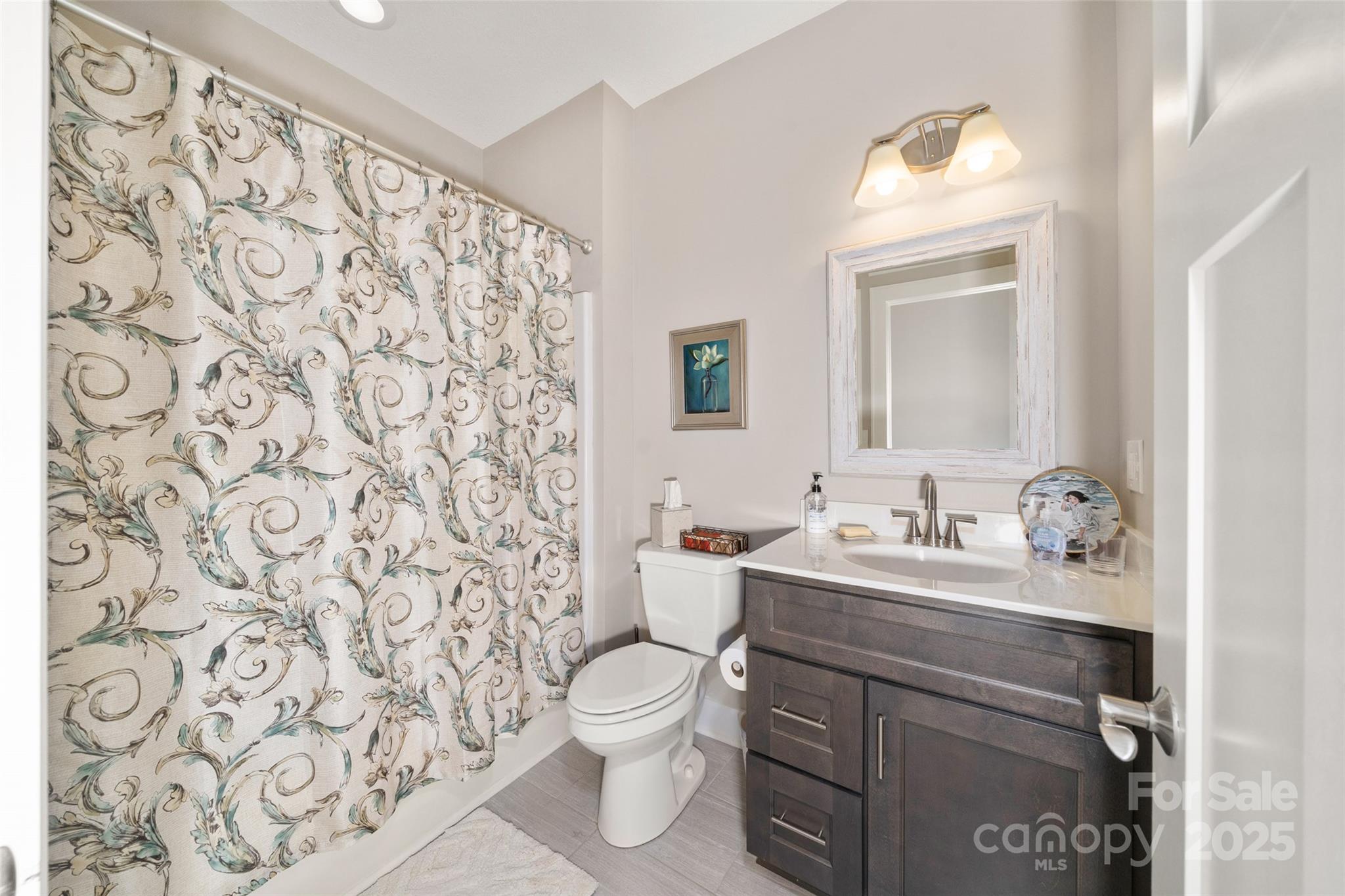 9 Vedder Way Swannanoa, NC 28778 - Photo 22 of 33 a bathroom with a sink toilet and shower