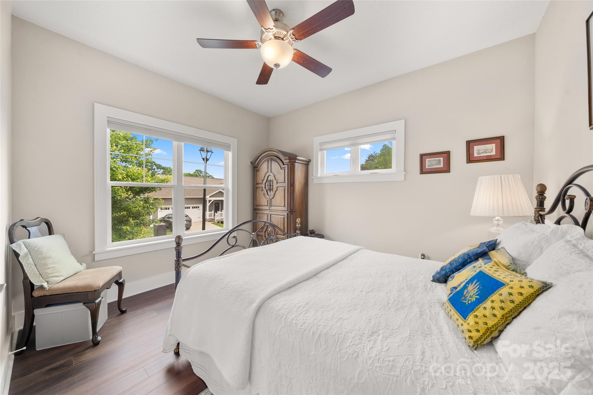 9 Vedder Way Swannanoa, NC 28778 - Photo 23 of 33 a spacious bedroom with a bed a couch and a window
