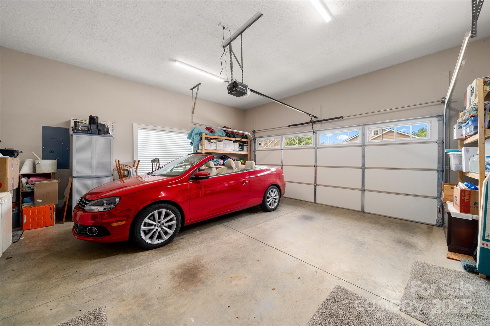 9 Vedder Way Swannanoa, NC 28778 - Photo 27 of 33 a car is parked in a garage