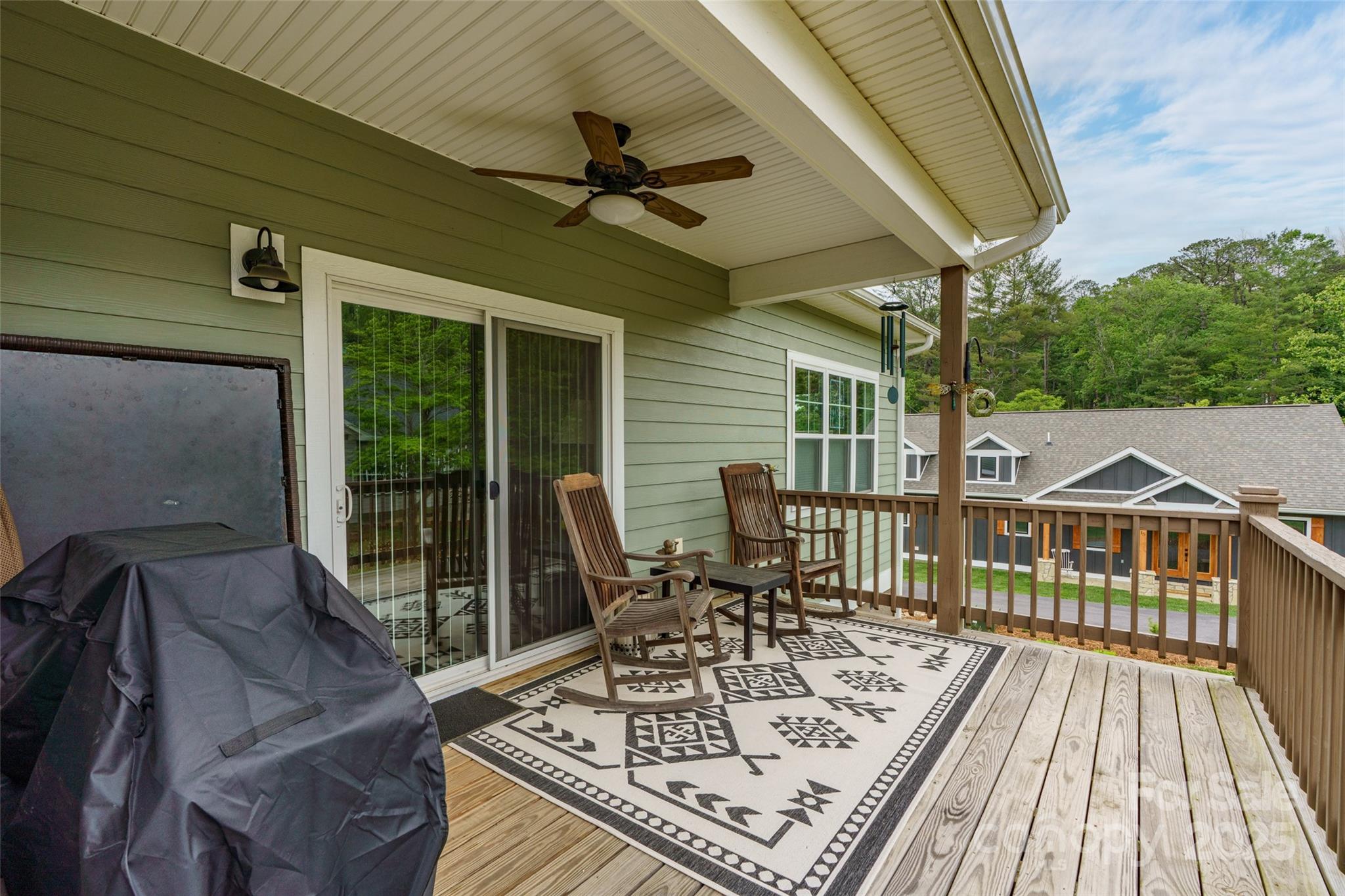 9 Vedder Way Swannanoa, NC 28778 - Photo 31 of 33 a view of a chairs and table on the deck