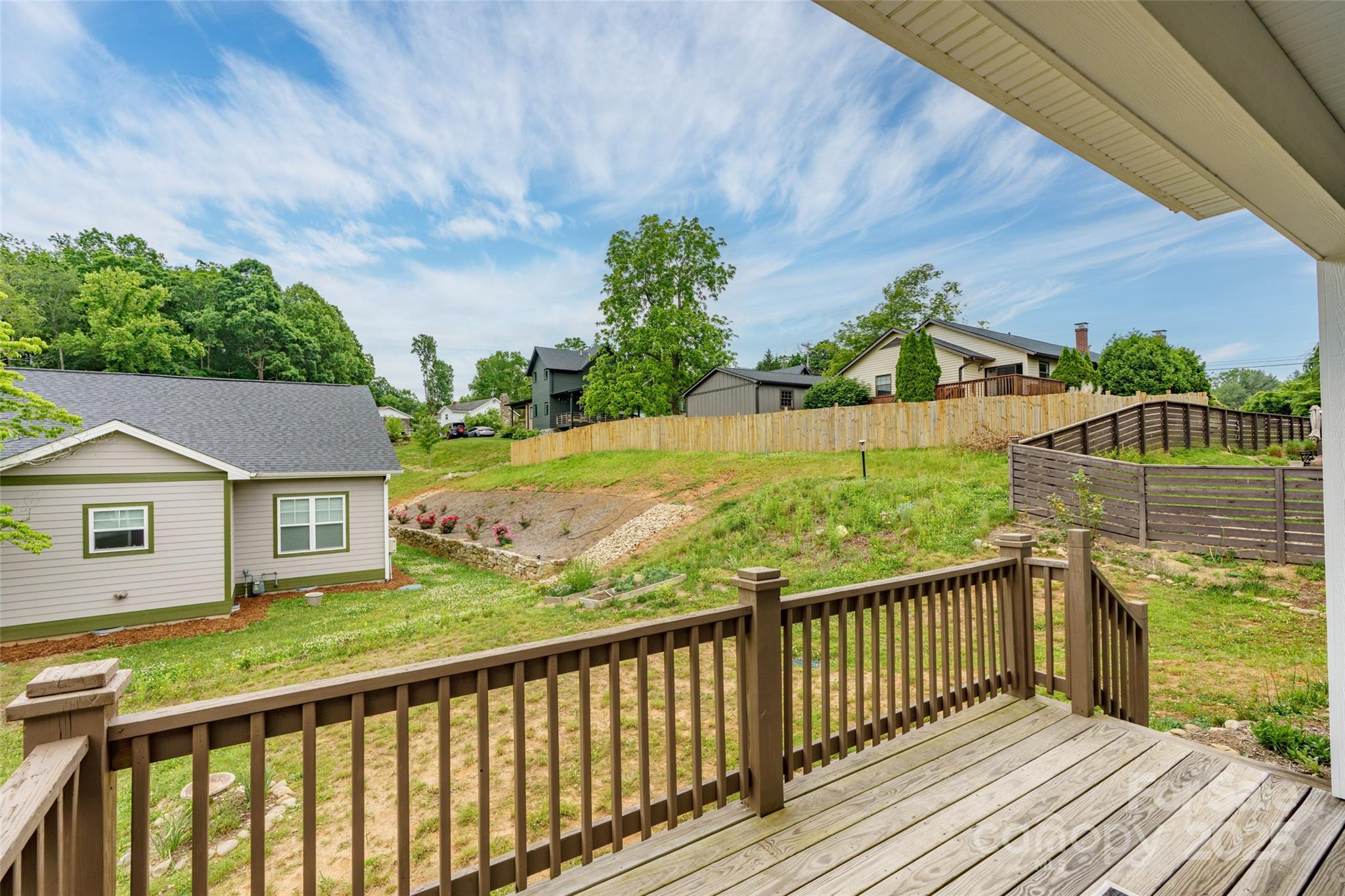 9 Vedder Way Swannanoa, NC 28778 - Photo 32 of 33 a view of a wooden deck and a yard