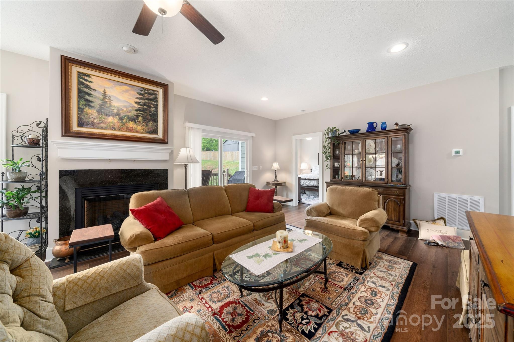 9 Vedder Way Swannanoa, NC 28778 - Photo 7 of 33 a living room with furniture fireplace and a large window