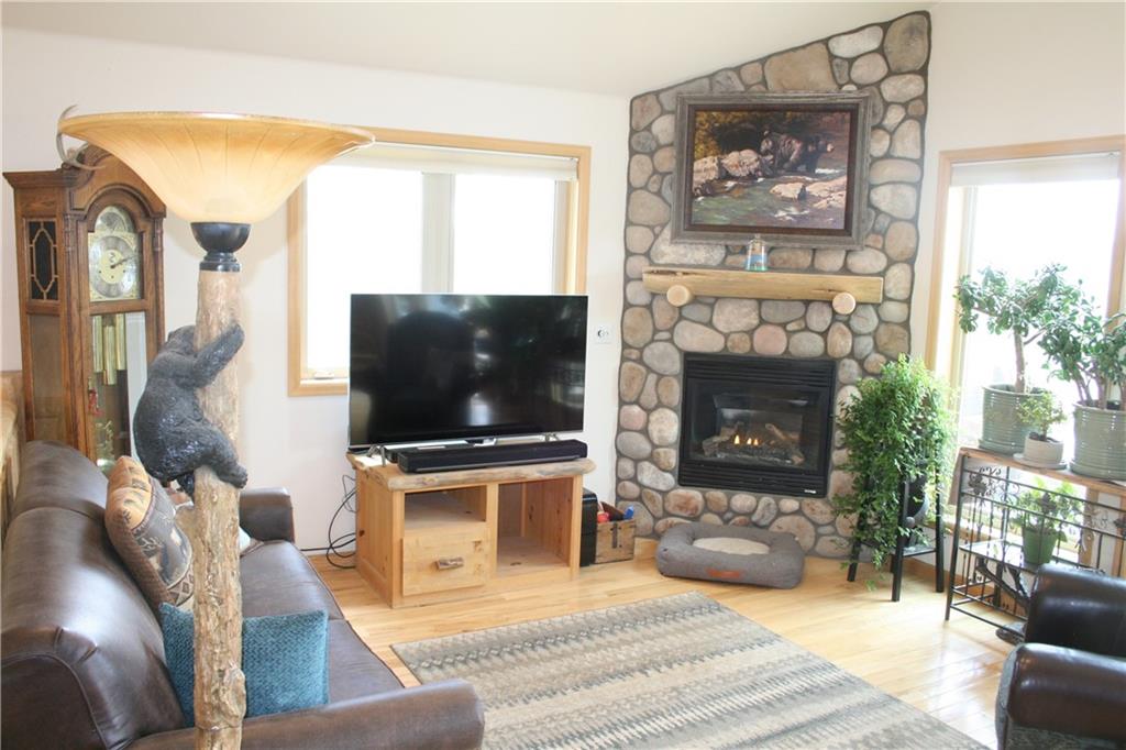 960 Sheep Ridge Road Fairplay, CO 80440 - Photo 7 of 34 a living room with furniture and a flat screen tv