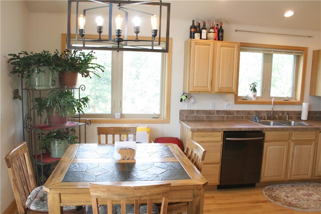 960 Sheep Ridge Road Fairplay, CO 80440 - Photo 10 of 34 a kitchen with a table and chairs in it