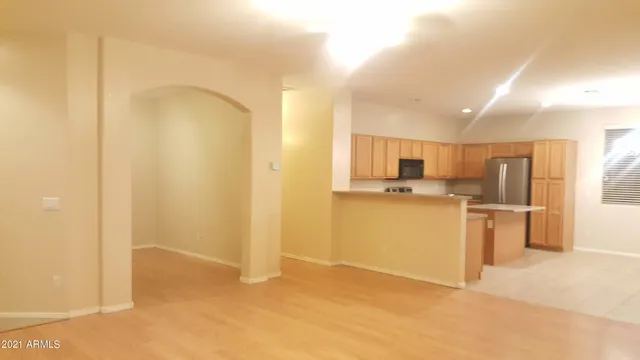 a view of a kitchen with a sink
