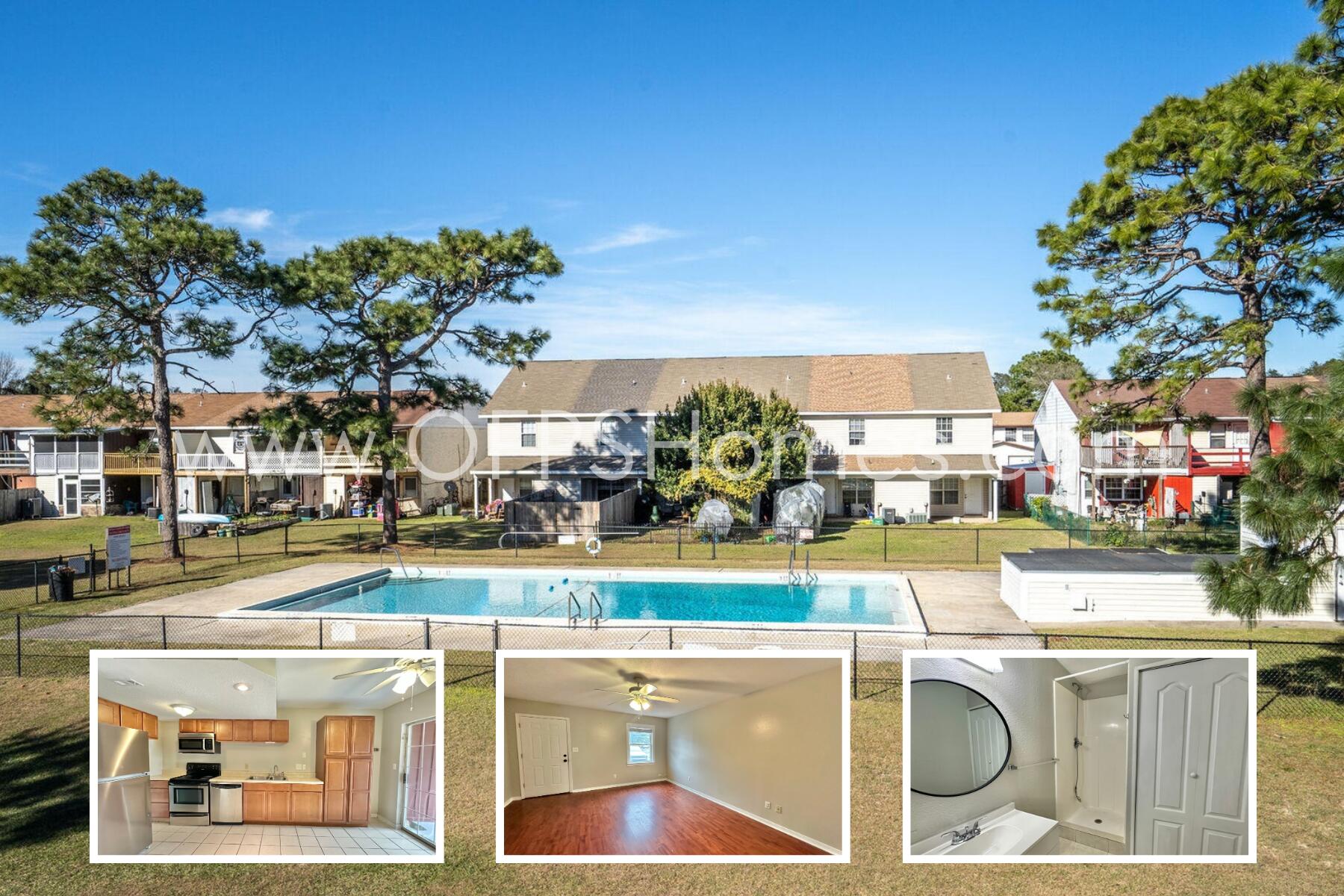 a view of a swimming pool with an outdoor seating