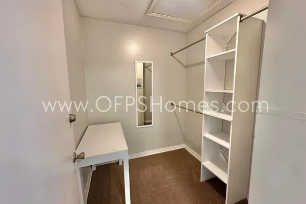 a bathroom with a sink and shower