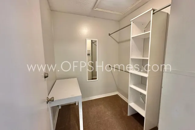 a bathroom with a sink and shower