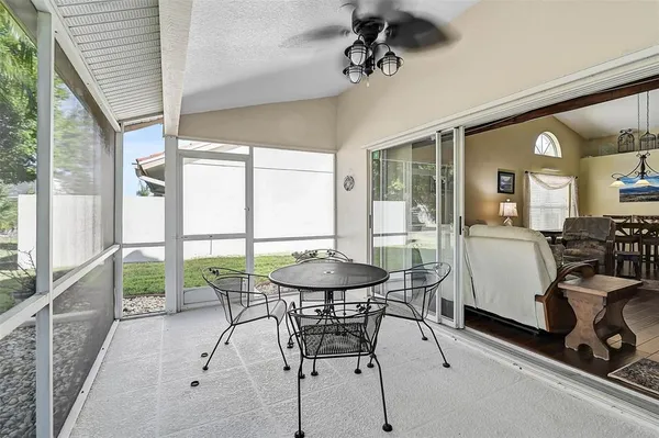 a room with furniture and a large window