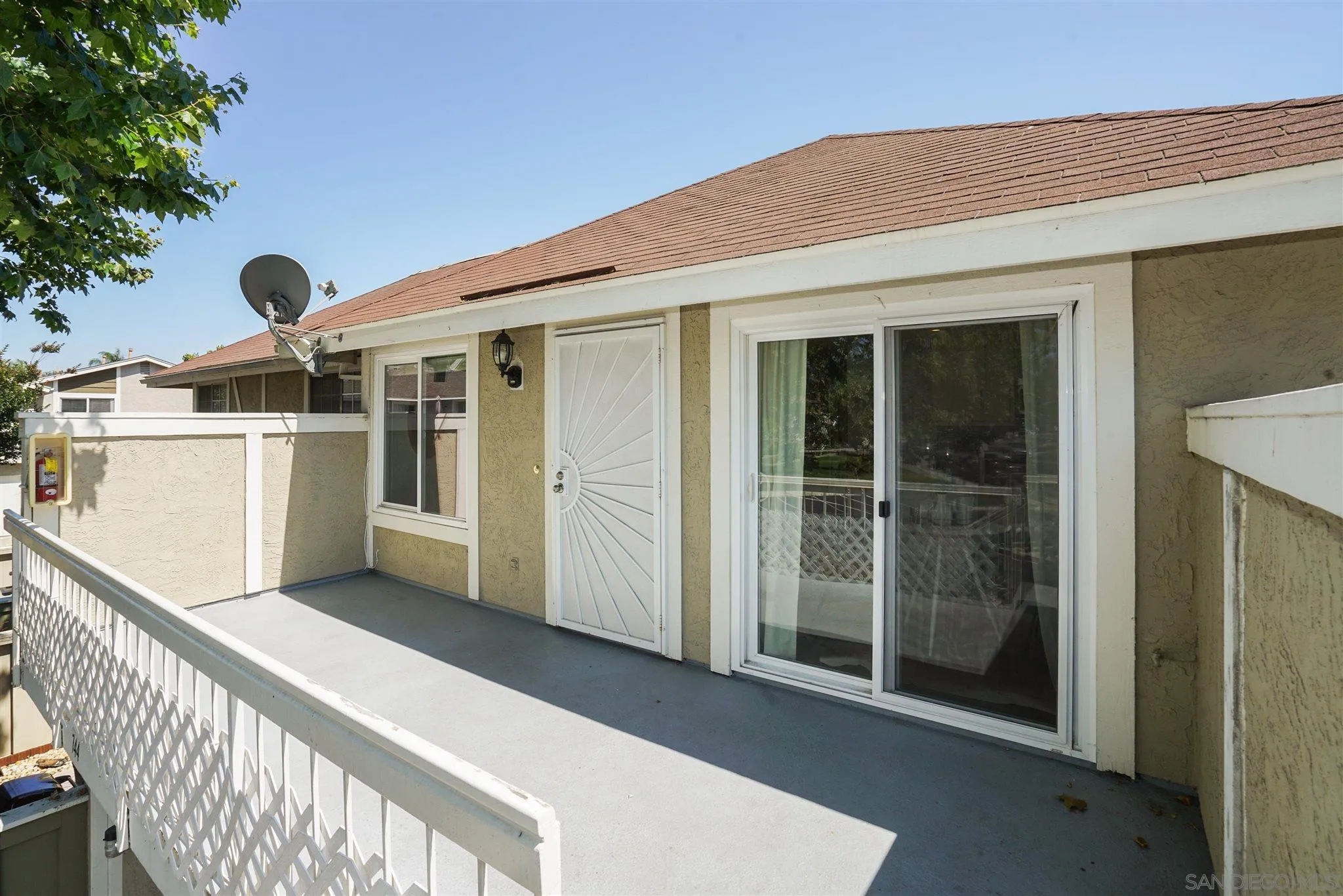 744 Pyramid Point Way Oceanside, CA 92058 - Photo 5 of 20 a front view of a house with wooden stairs