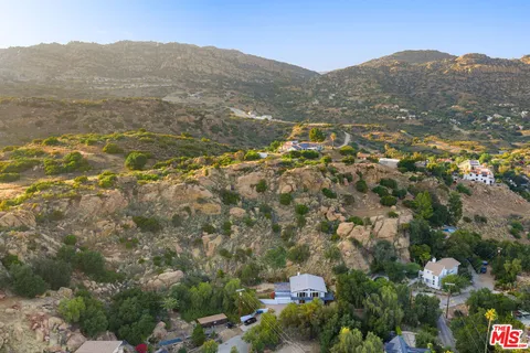 a view of lake and mountain