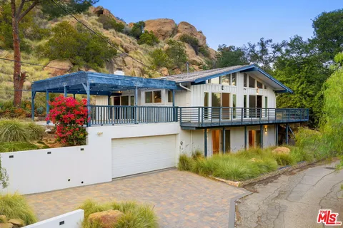 a view of a house with sitting area