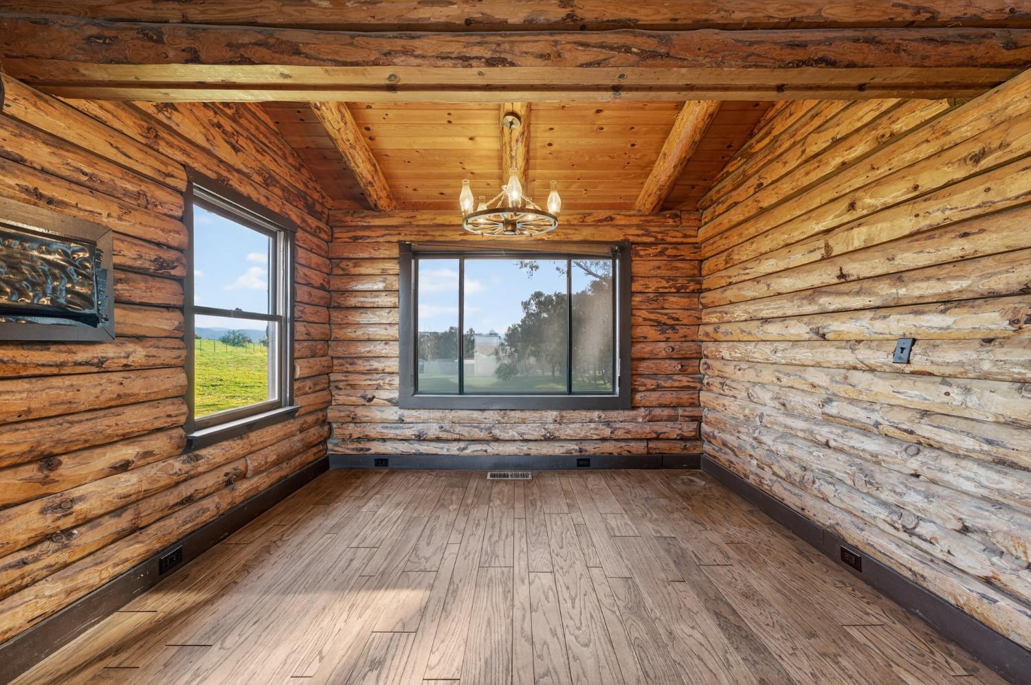 9798 Butte View Marysville, CA 95901 - Photo 13 of 55 a view of empty room with wooden floor and fan