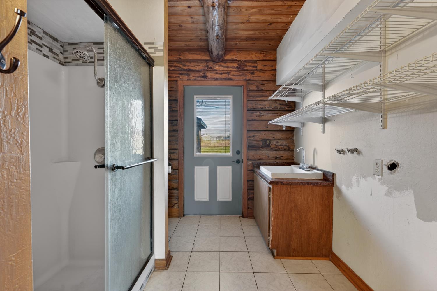 9798 Butte View Marysville, CA 95901 - Photo 23 of 55 a view of a storage & utility room with washer and dryer
