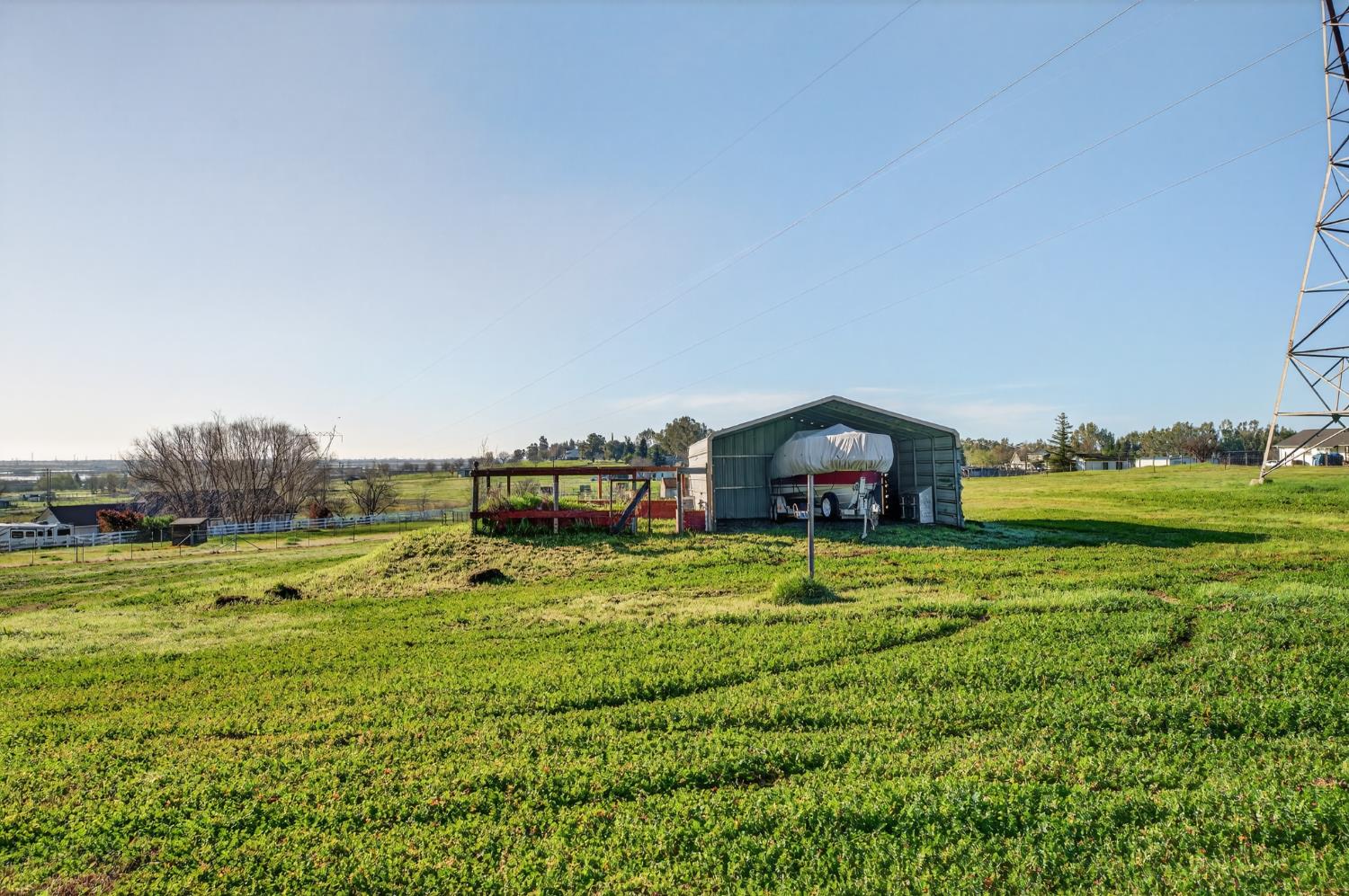 9798 Butte View Marysville, CA 95901 - Photo 45 of 55 a backyard of a house with table and chairs