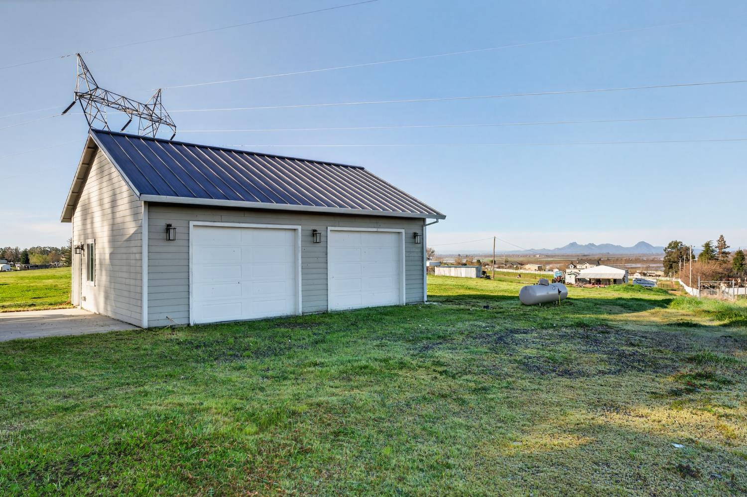 9798 Butte View Marysville, CA 95901 - Photo 52 of 55 a backyard of a house with table and chairs