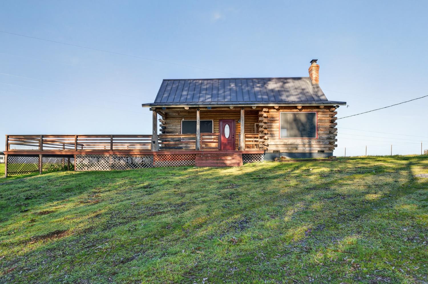 9798 Butte View Marysville, CA 95901 - Photo 55 of 55 a front view of a house with a yard