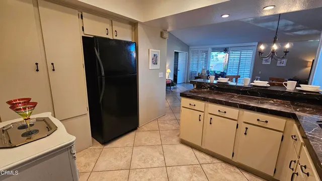 a living room with hard wood flooring and a fireplace