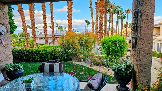 a view of play ground and pool