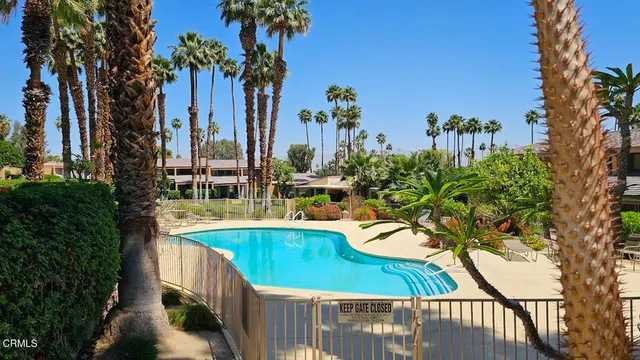 a view of a swimming pool with a patio