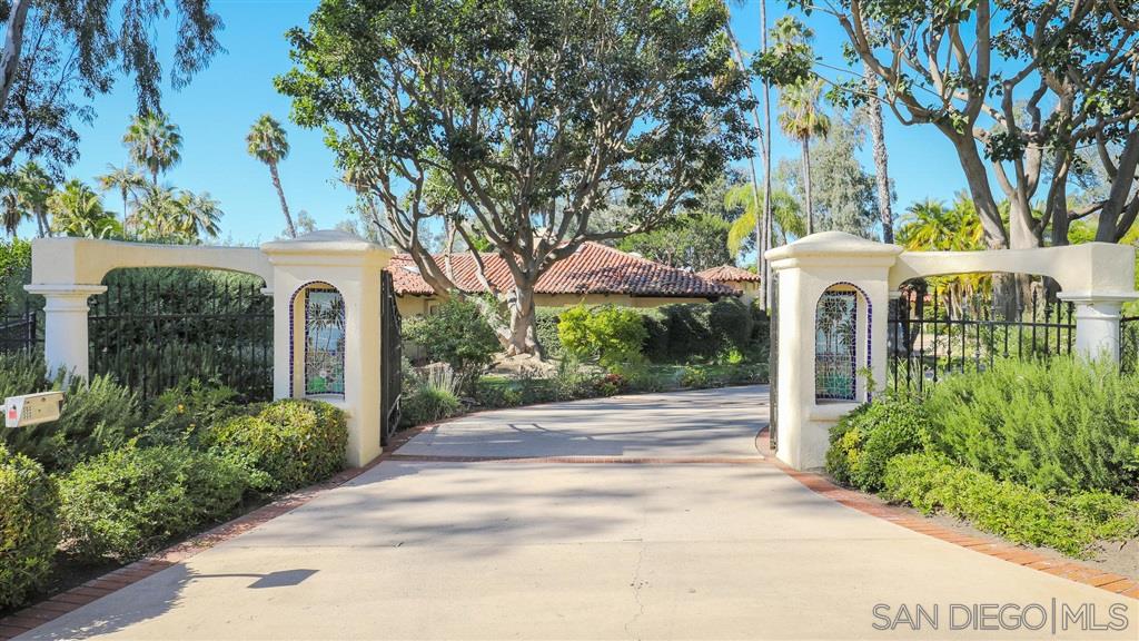 16556 Los Barbos Rancho Santa Fe, CA 92067 - Photo 1 of 22 a front view of a house with garden
