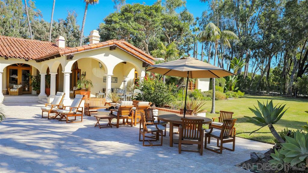 16556 Los Barbos Rancho Santa Fe, CA 92067 - Photo 17 of 22 a view of a swimming pool with sitting area and furniture