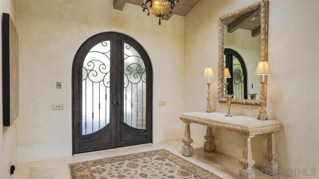 16556 Los Barbos Rancho Santa Fe, CA 92067 - Photo 3 of 22 a bathroom with a sink and a mirror