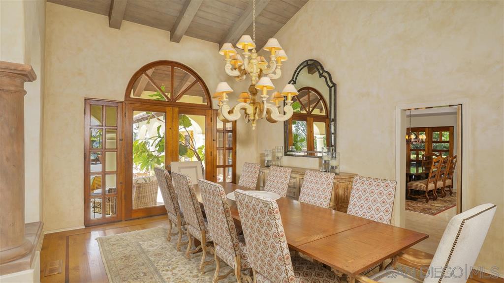 16556 Los Barbos Rancho Santa Fe, CA 92067 - Photo 6 of 22 a view of a dining room with furniture and a window