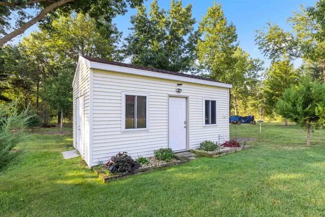 a view of a house with a big yard