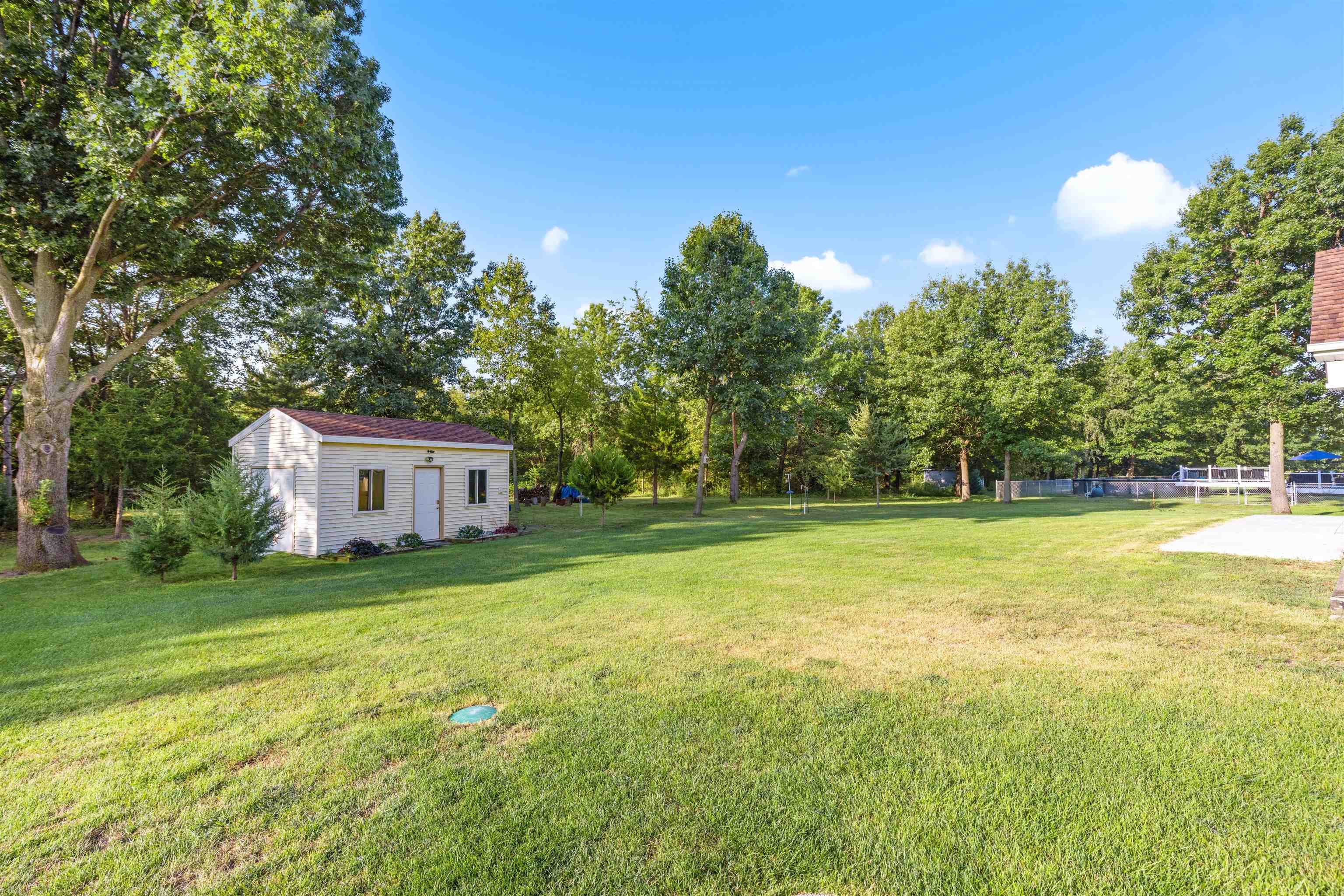 113 Taylor Lane Thomson, IL 61285 - Photo 26 of 29 a view of a house with a big yard
