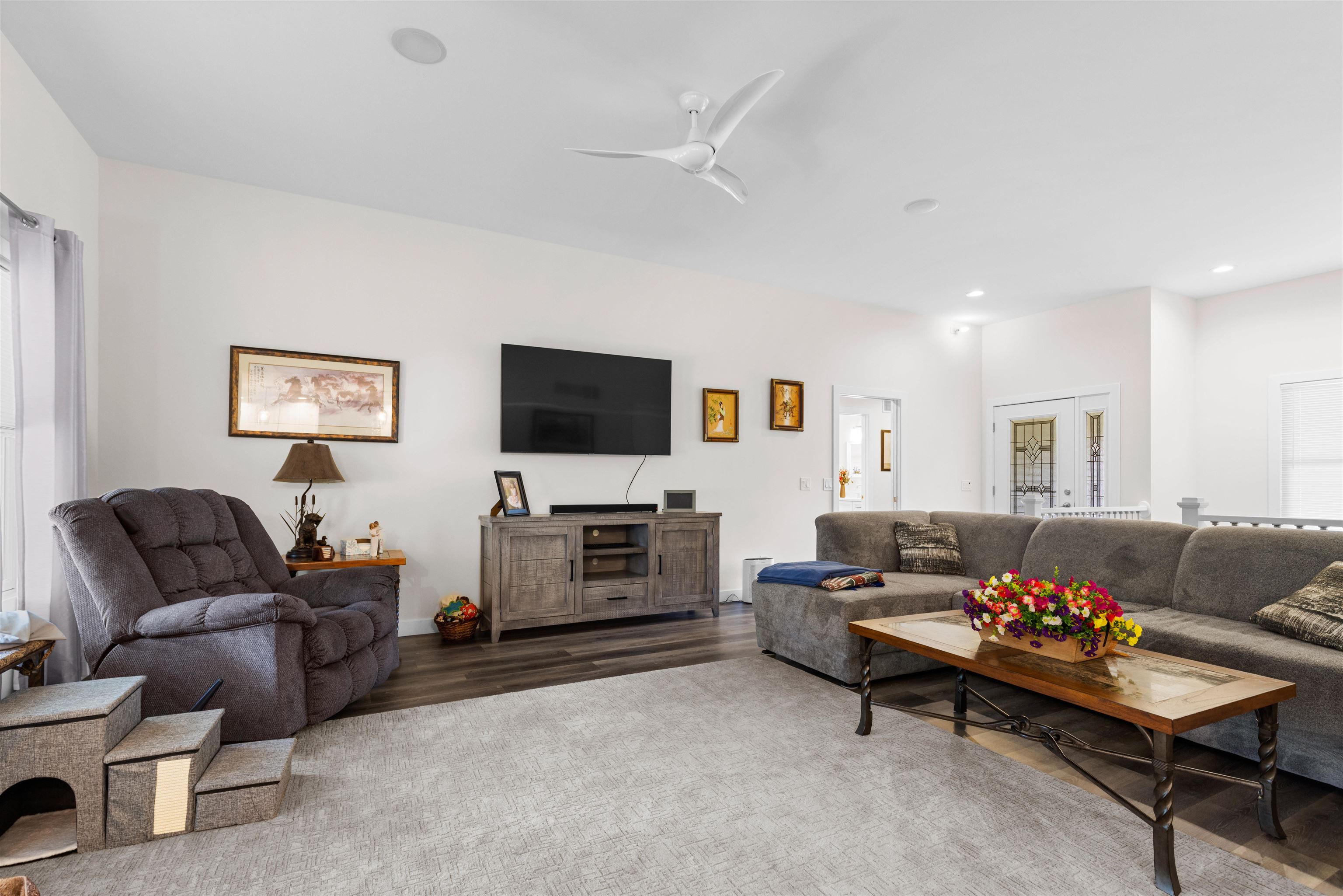 113 Taylor Lane Thomson, IL 61285 - Photo 3 of 29 a living room with furniture and a flat screen tv