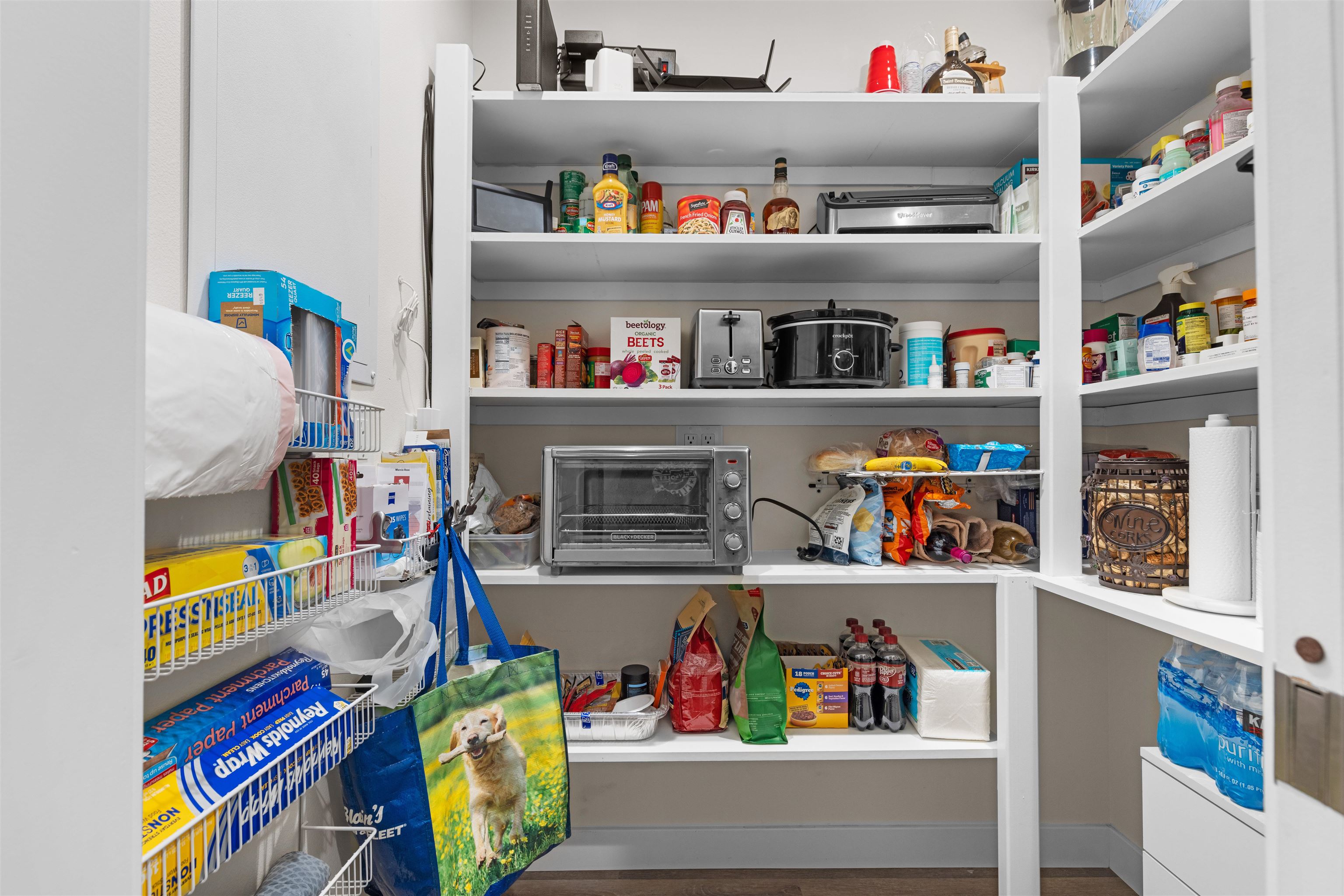 113 Taylor Lane Thomson, IL 61285 - Photo 8 of 29 a utility room with fridge and a bed