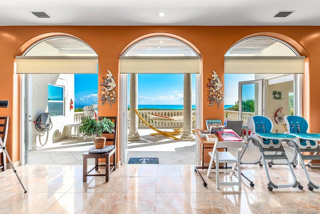 1981 Northeast Ocean Boulevard Stuart, FL 34996 - Photo 13 of 51 a view of living room and dining room