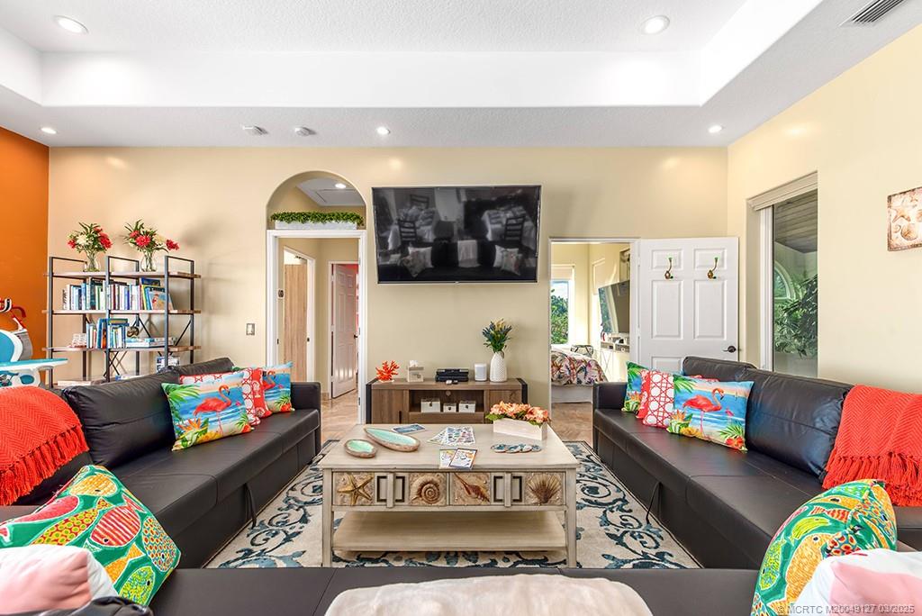 1981 Northeast Ocean Boulevard Stuart, FL 34996 - Photo 18 of 51 a living room with furniture and a couch