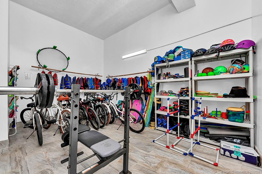 1981 Northeast Ocean Boulevard Stuart, FL 34996 - Photo 48 of 51 a view of a storage area with shelves