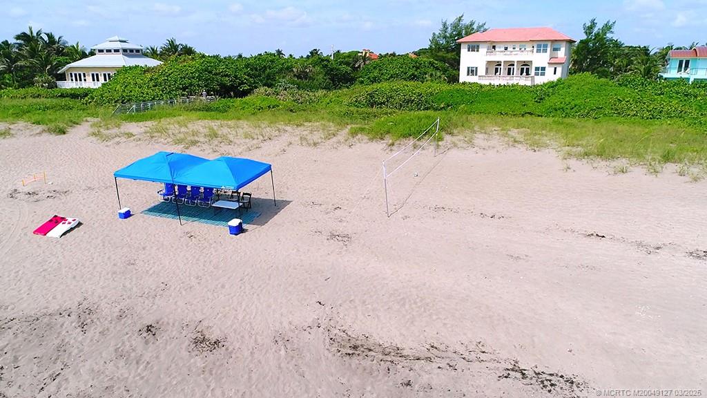 1981 Northeast Ocean Boulevard Stuart, FL 34996 - Photo 8 of 51 a view of a lake with beach and outdoor space