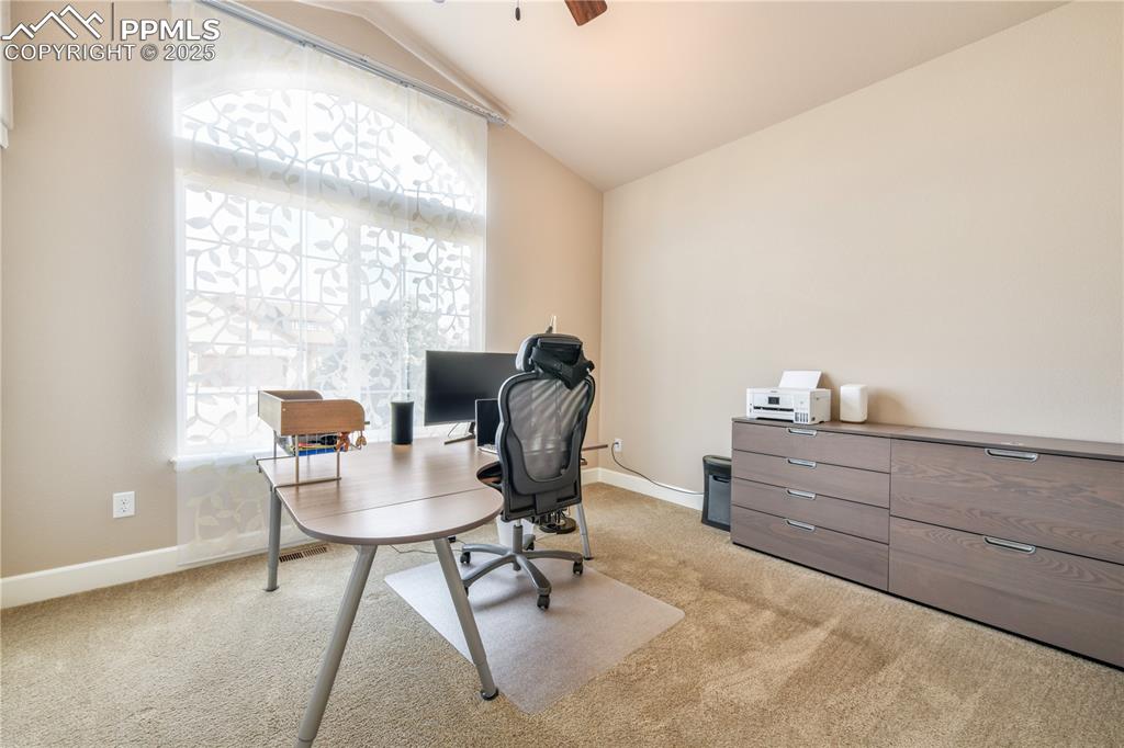 10484 Mile Post Loop Fountain, CO 80817 - Photo 25 of 50 a room with furniture and a window