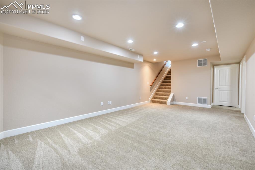 10484 Mile Post Loop Fountain, CO 80817 - Photo 37 of 50 an empty room with stairs and ventilation