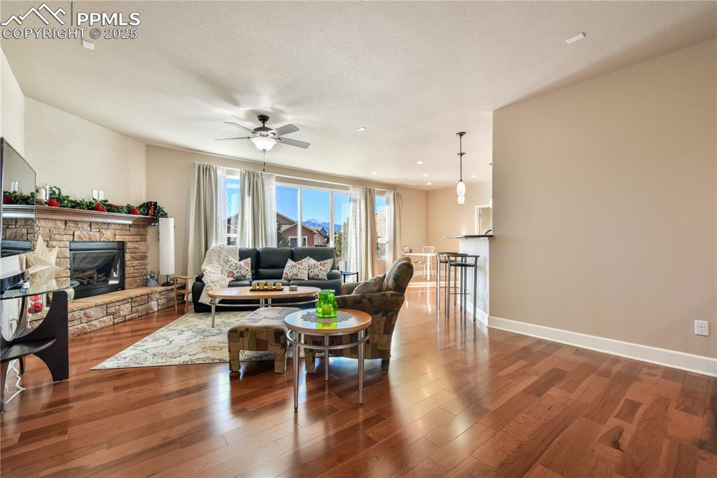 10484 Mile Post Loop Fountain, CO 80817 - Photo 5 of 50 a view of a dining room with furniture window and wooden floor