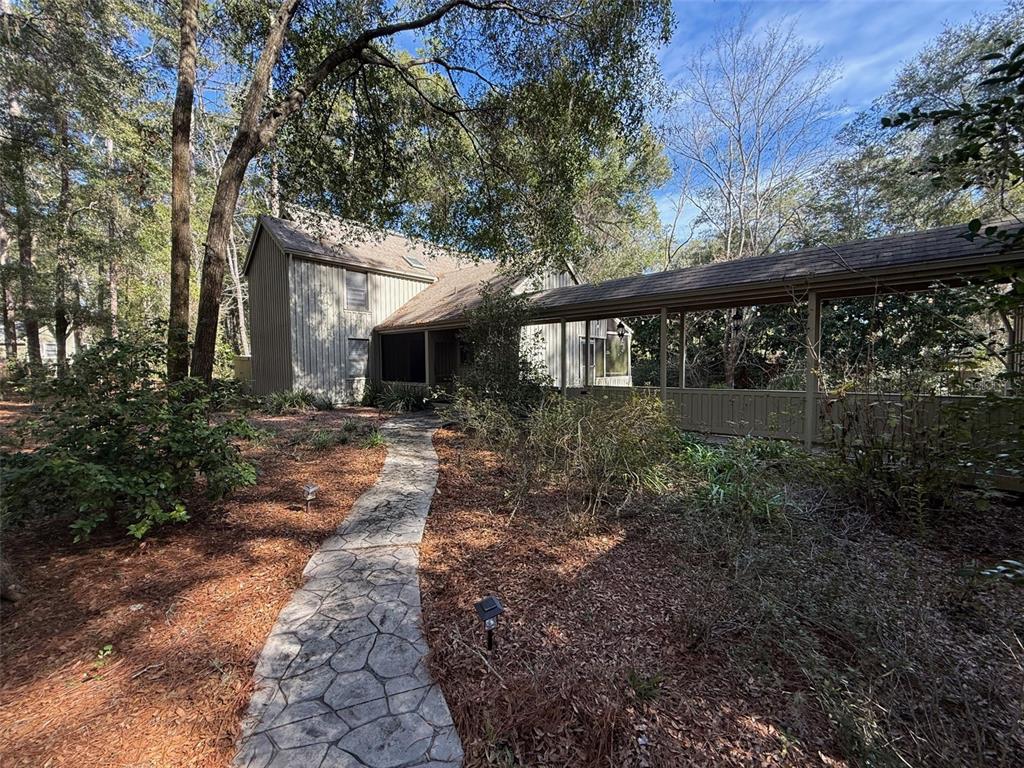 a backyard of a house with lots of green space