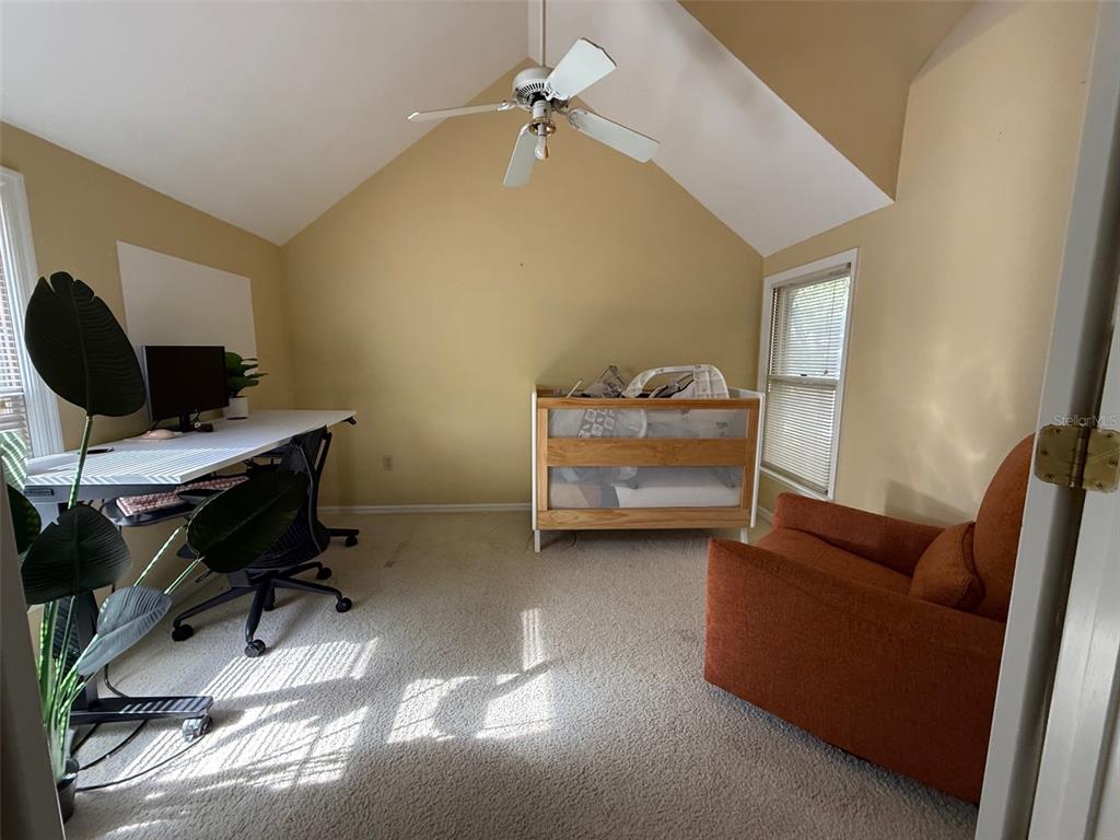 5601 Southwest 83 Drive Gainesville, FL 32608 - Photo 14 of 21 a view of workspace with lounge chair