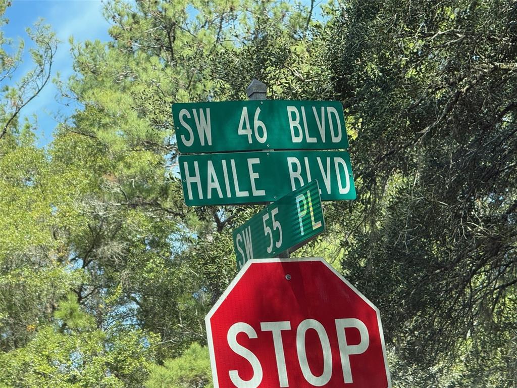 5601 Southwest 83 Drive Gainesville, FL 32608 - Photo 20 of 21 a view of outdoor space with signage and flags