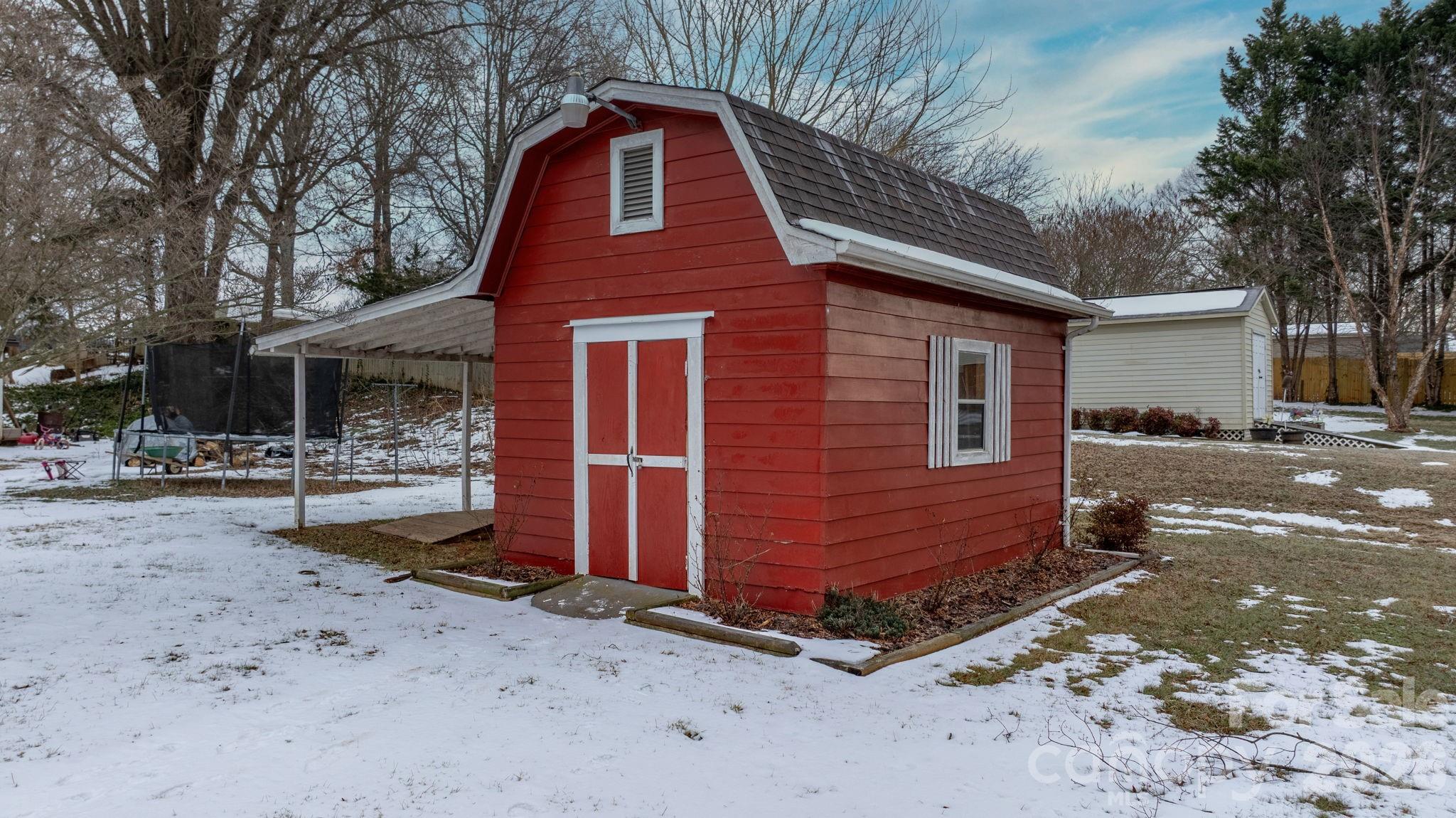 1802 33rd Street Northeast Hickory, NC 28601 - Photo 14 of 21 a front view of a house with a yard