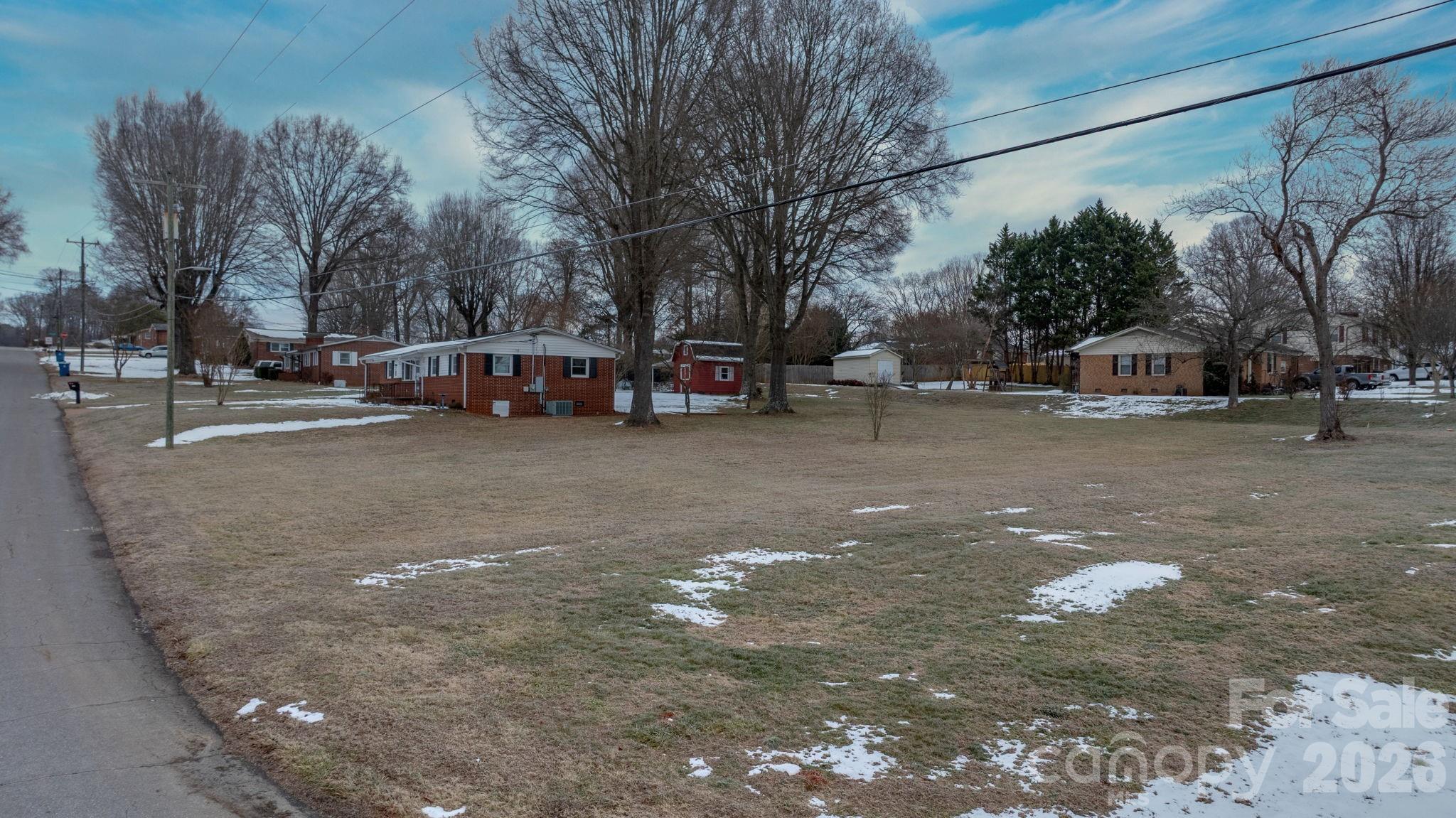 1802 33rd Street Northeast Hickory, NC 28601 - Photo 17 of 21 a view of a street with a cars parked on the road