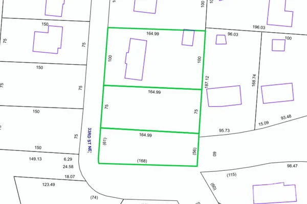 a house that has a tree in front of it