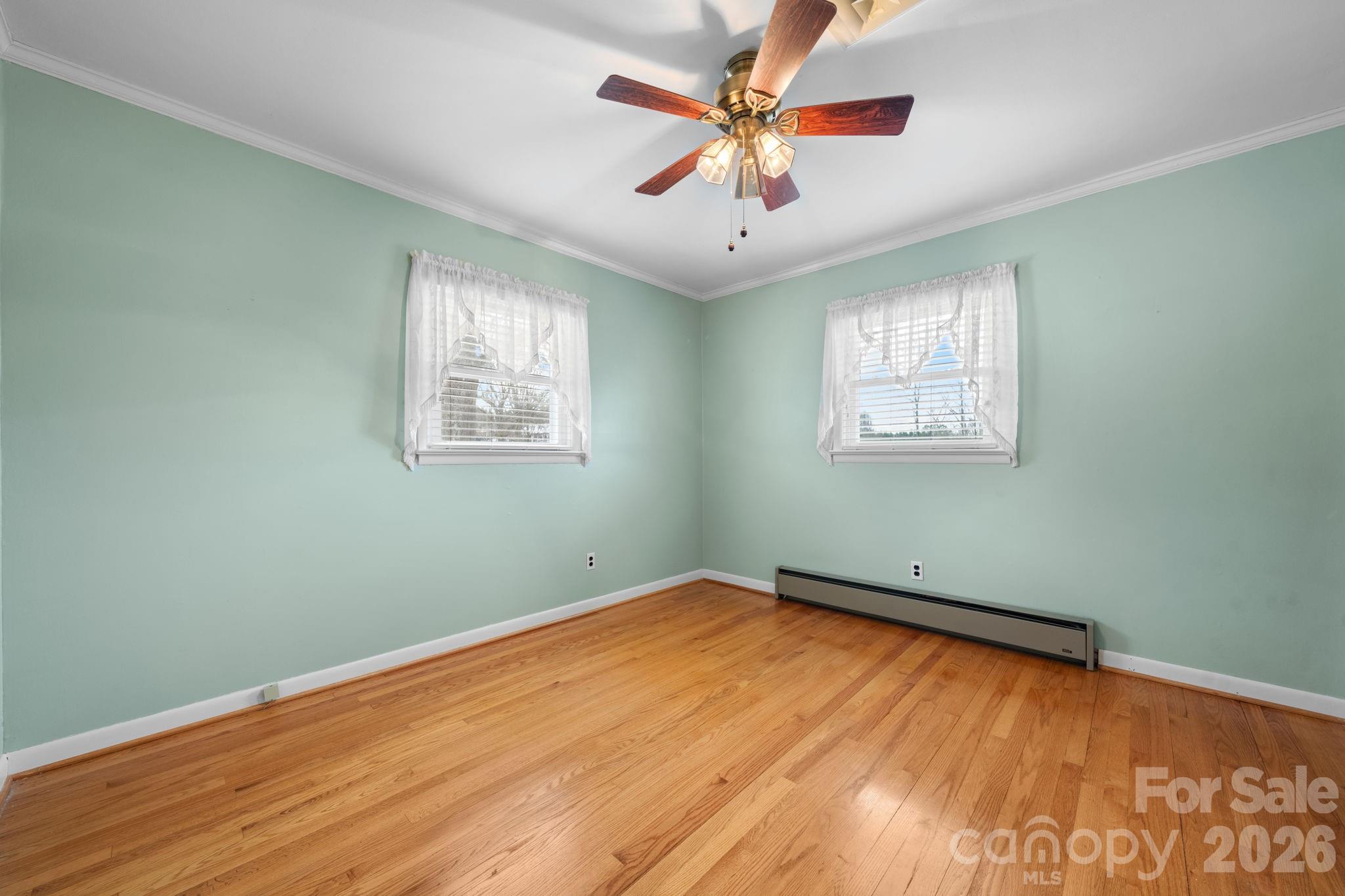 1802 33rd Street Northeast Hickory, NC 28601 - Photo 6 of 21 wooden floor in an empty room with a window