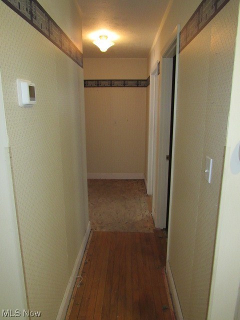 3102 State Road Vermilion, OH 44089 - Photo 33 of 45 Corridor with dark wood-type flooring