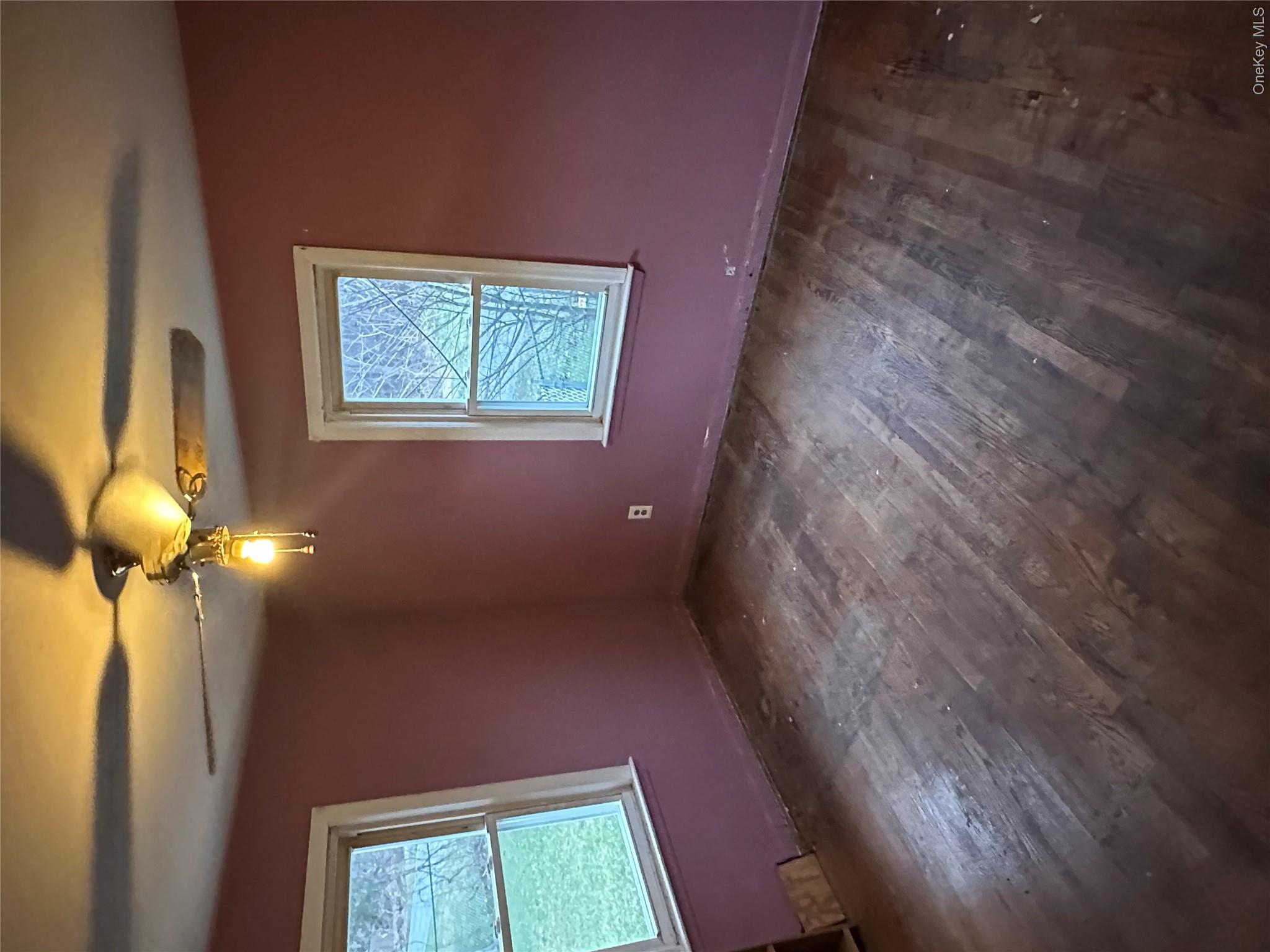 12 Bruce Street Newburgh, NY 12550 - Photo 7 of 8 a view of an empty room with a window